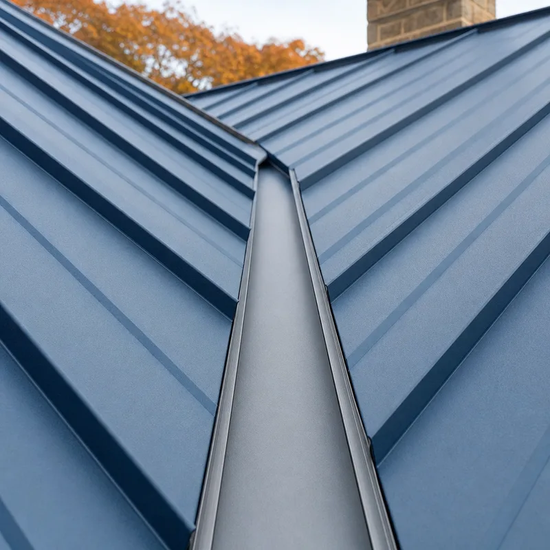 Clean valley metal on a steel roof with properly formed edges where two roof planes meet